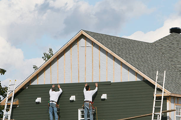 Professional Storm Damage Siding Repair technician working in Red Lion, PA